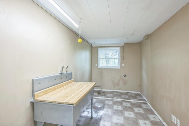 laundry room featuring light floors