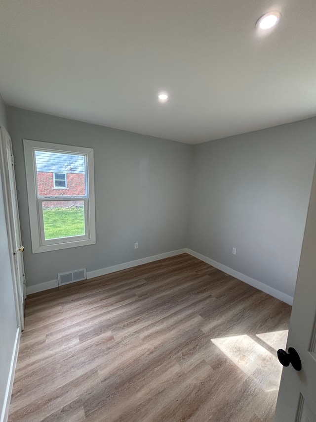 11414 Abington Ave, Detroit, MI 48227 - unfurnished room featuring wood finished floors, baseboards, and recessed lighting