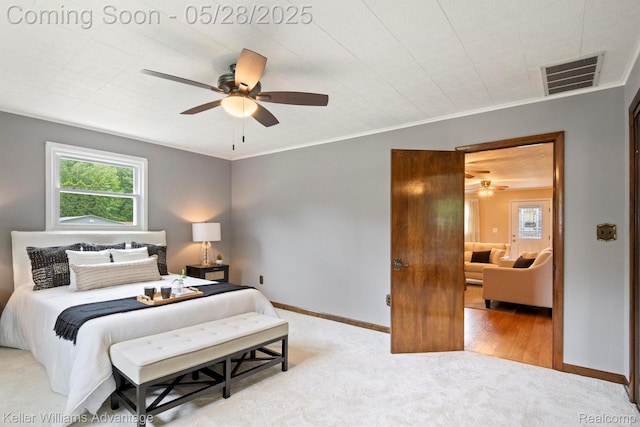 40755 Judd Rd, Belleville, MI 48111 - carpeted bedroom with multiple windows, baseboards, and a ceiling fan