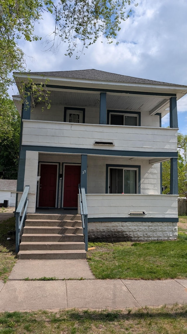 39 Iona Ave, Muskegon, MI 49442 - view of front of property with a balcony and covered porch