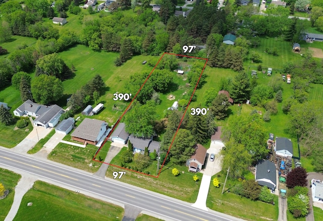 aerial view of residential area featuring property boundaries highlighted