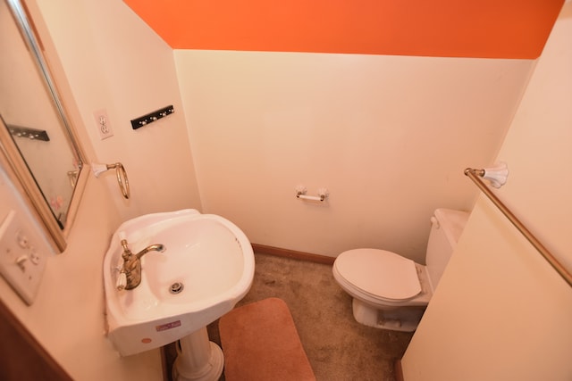 bathroom featuring a sink and toilet