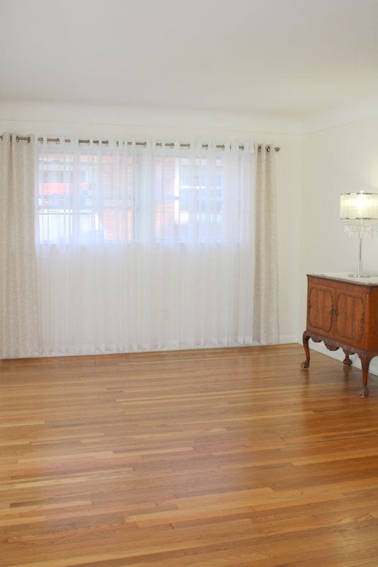 empty room featuring plenty of natural light and light wood-type flooring