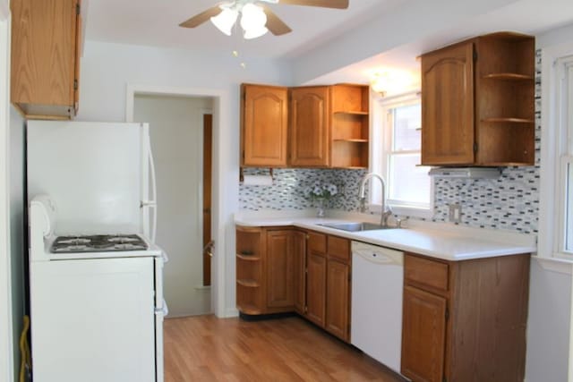 kitchen with open shelves, white appliances, ceiling fan, and backsplash
