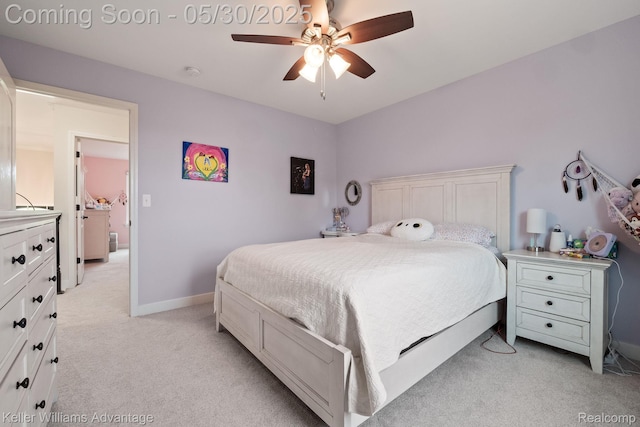 41740 Steinbeck Gln, Novi, MI 48377 - bedroom with light carpet, ceiling fan, and baseboards