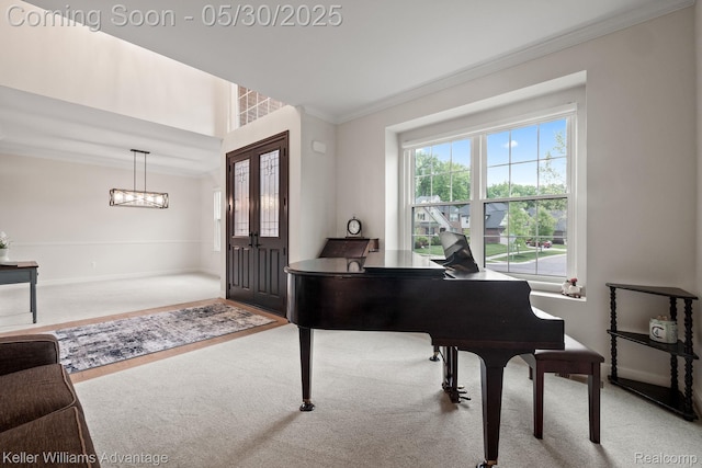 41740 Steinbeck Gln, Novi, MI 48377 - carpeted entryway featuring crown molding, baseboards, and a chandelier