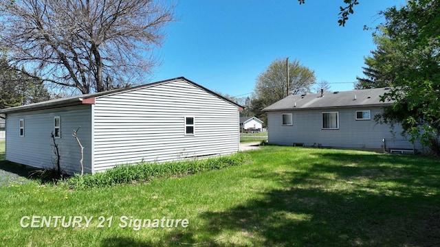 3455 Angel Dr, Saginaw, MI 48601 - rear view of property with a yard