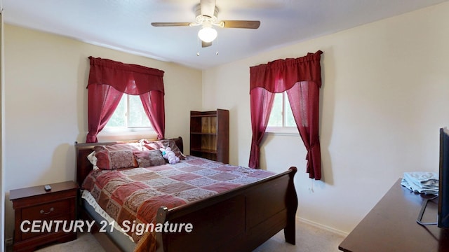 3455 Angel Dr, Saginaw, MI 48601 - bedroom with carpet flooring, baseboards, and a ceiling fan