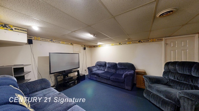 3455 Angel Dr, Saginaw, MI 48601 - living room with concrete floors and a paneled ceiling