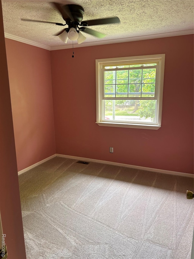 809 Isbell St, Howell, MI 48843 - spare room featuring ceiling fan, a textured ceiling, carpet floors, ornamental molding, and baseboards