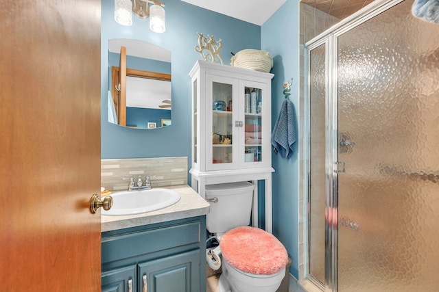 652 S Military St, Dearborn, MI 48124 - full bath featuring a stall shower, toilet, and vanity
