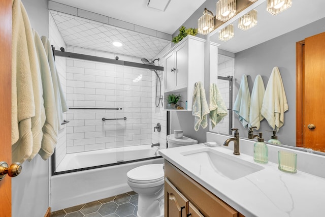 652 S Military St, Dearborn, MI 48124 - bathroom with tile patterned floors, toilet, vanity, shower / bath combination with glass door, and a chandelier