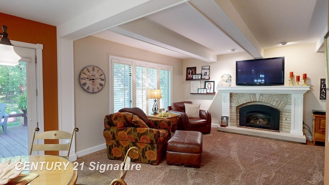 living room featuring carpet flooring, healthy amount of natural light, beamed ceiling, and a fireplace