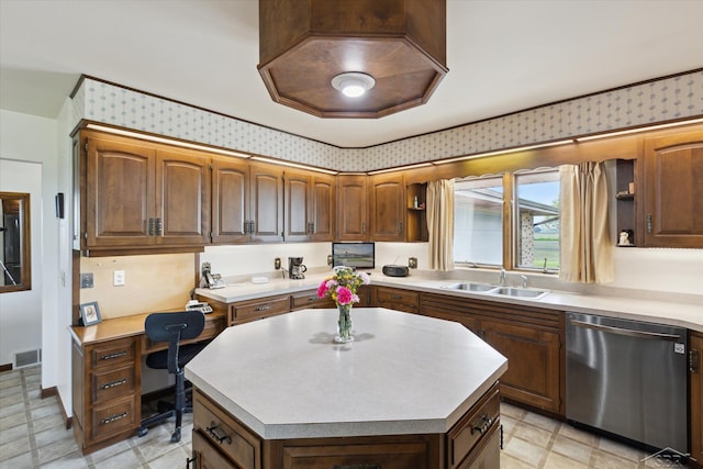 280 E Nebobish Rd, Essexville, MI 48732 - kitchen featuring stainless steel dishwasher, a sink, light countertops, a center island, and a desk