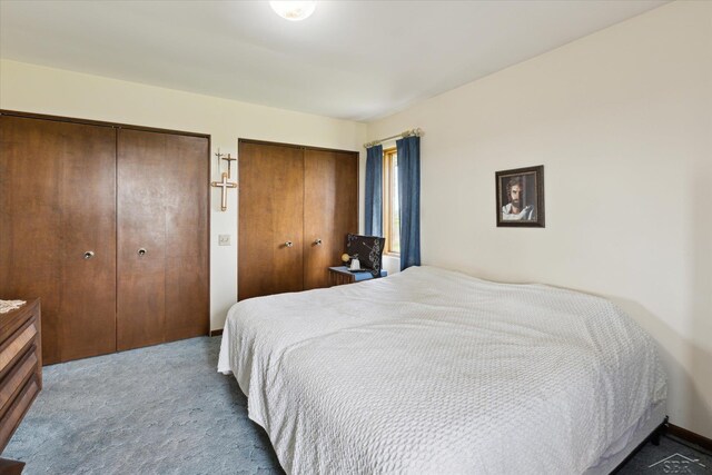 280 E Nebobish Rd, Essexville, MI 48732 - bedroom featuring multiple closets and carpet floors