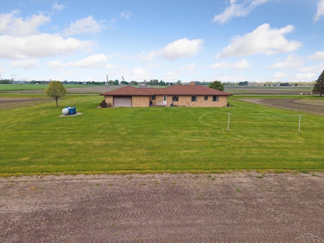 280 E Nebobish Rd, Essexville, MI 48732 - ranch-style house with a front yard, a garage, and brick siding