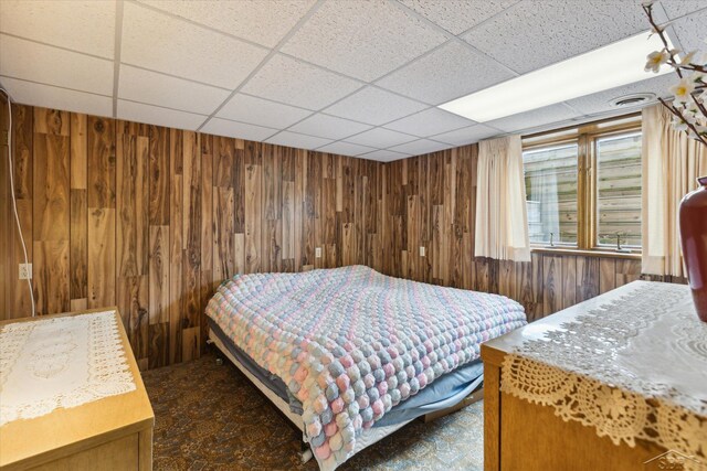 280 E Nebobish Rd, Essexville, MI 48732 - bedroom with wooden walls and a paneled ceiling