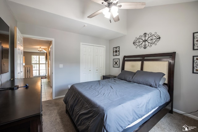2827 Biddle Ave, Wyandotte, MI 48192 - carpeted bedroom with a closet, baseboards, and ceiling fan