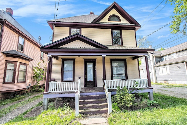 view of front of property featuring covered porch