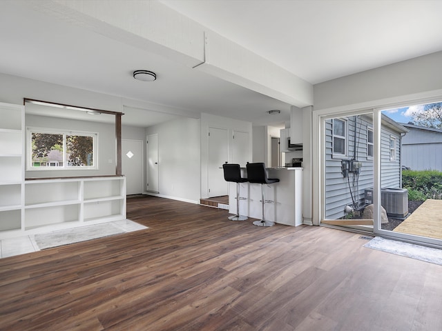 600 Los Arboles Dr, Wolverine Lake, MI 48390 - living room with wood finished floors and baseboards