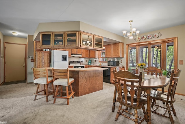 3641 Timber Ridge Dr, Metamora, MI 48455 - dining room featuring light colored carpet and a chandelier