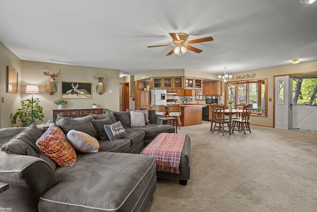 3641 Timber Ridge Dr, Metamora, MI 48455 - living room featuring a ceiling fan, a chandelier, and light colored carpet
