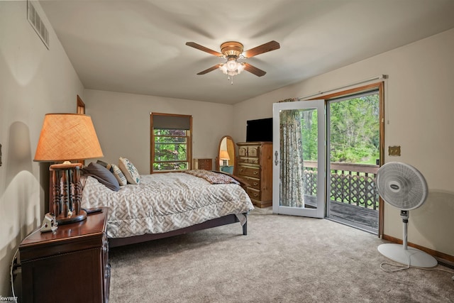 3641 Timber Ridge Dr, Metamora, MI 48455 - carpeted bedroom featuring access to outside, baseboards, and ceiling fan