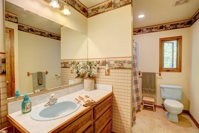 3641 Timber Ridge Dr, Metamora, MI 48455 - full bathroom with toilet, vanity, and baseboards