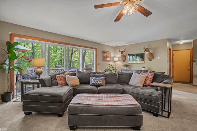 3641 Timber Ridge Dr, Metamora, MI 48455 - living area featuring light colored carpet and a ceiling fan