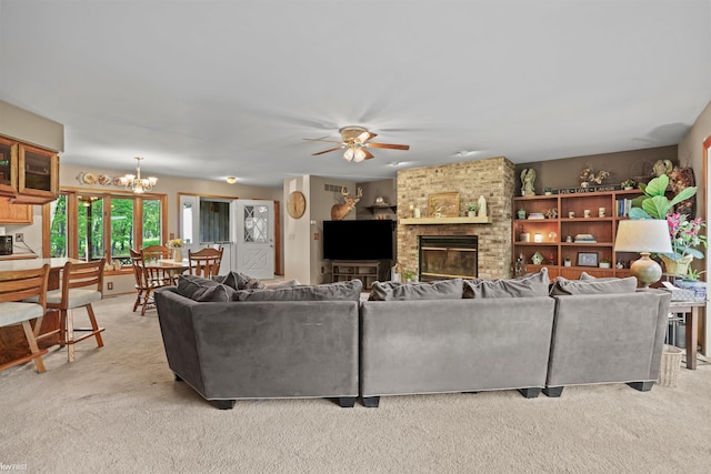 3641 Timber Ridge Dr, Metamora, MI 48455 - living area featuring light carpet, a chandelier, ceiling fan, and a brick fireplace