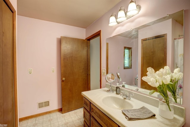 3641 Timber Ridge Dr, Metamora, MI 48455 - bathroom featuring vanity and baseboards