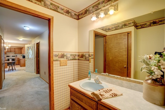 3641 Timber Ridge Dr, Metamora, MI 48455 - bathroom with vanity and a wainscoted wall