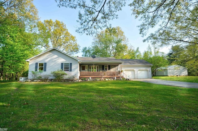 3641 Timber Ridge Dr, Metamora, MI 48455 - ranch-style house with a garage, a front yard, and asphalt driveway