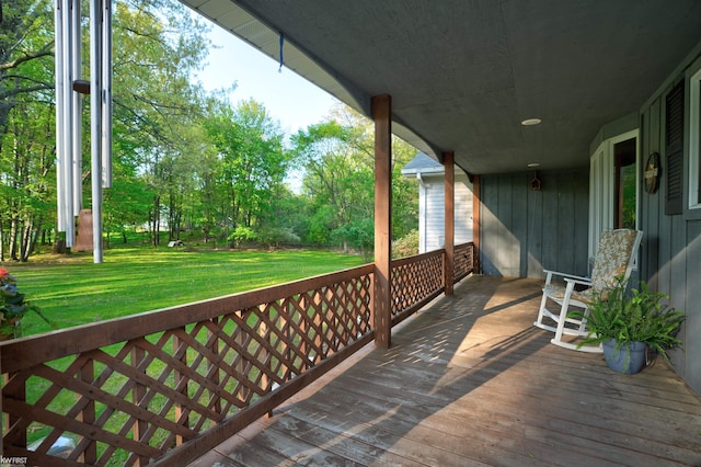 3641 Timber Ridge Dr, Metamora, MI 48455 - deck with a lawn and covered porch