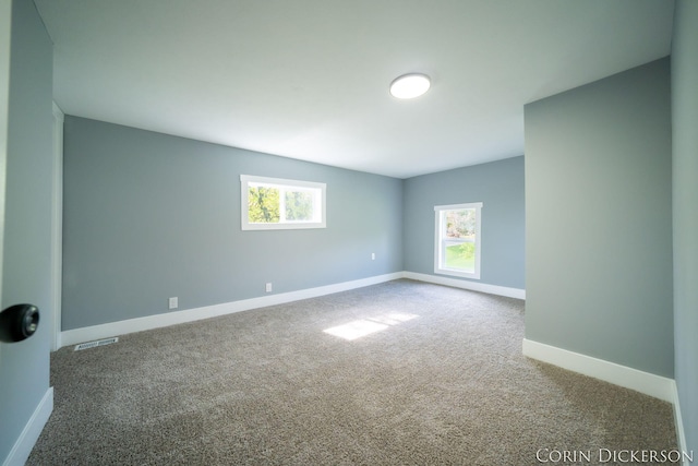 3188 E Stage Rd, Ionia, MI 48846 - carpeted spare room featuring baseboards