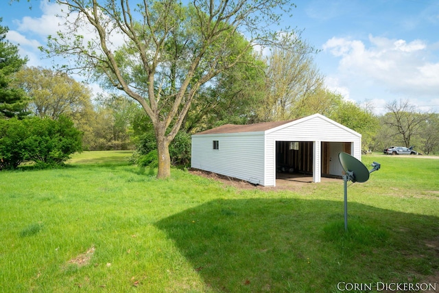 3188 E Stage Rd, Ionia, MI 48846 - view of grassy yard featuring an outbuilding