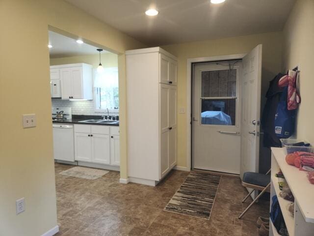 1788 W Beaver Rd, Bitely, MI 49309 - kitchen with white appliances, a sink, white cabinetry, recessed lighting, and backsplash