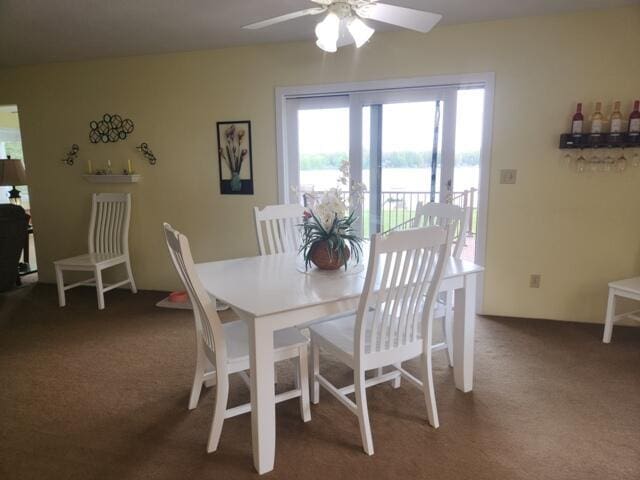 1788 W Beaver Rd, Bitely, MI 49309 - carpeted dining room with a ceiling fan