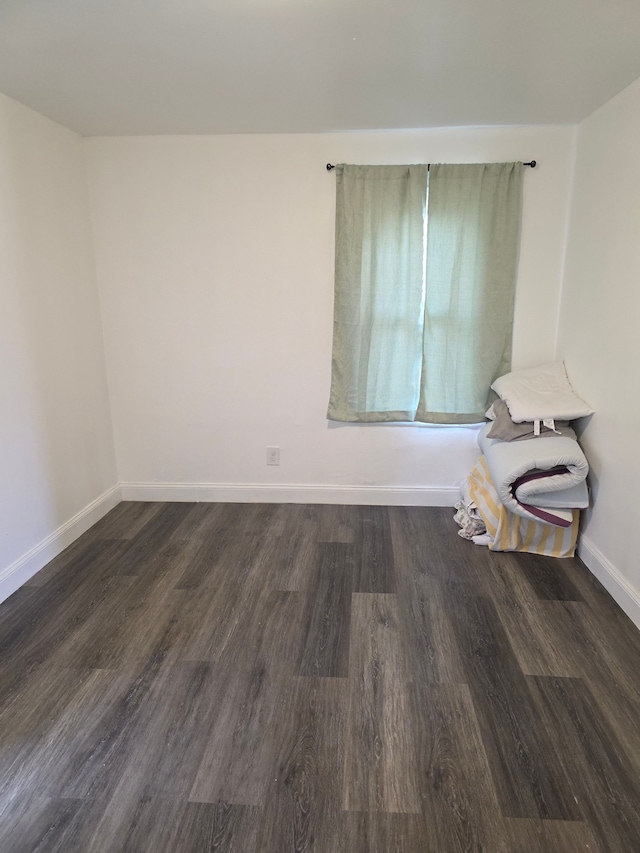 8845 Faust Ave, Detroit, MI 48228 - unfurnished room with wood finished floors and baseboards