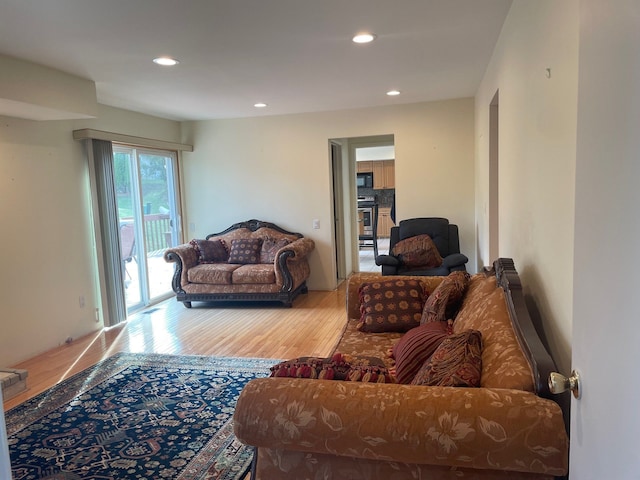 5250 Hardwoods Dr, West Bloomfield, MI 48323 - living room featuring wood finished floors and recessed lighting
