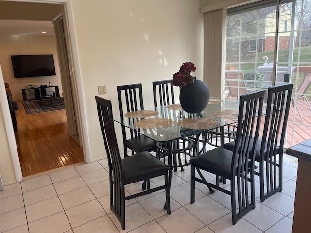 5250 Hardwoods Dr, West Bloomfield, MI 48323 - dining area with baseboards and light tile patterned flooring
