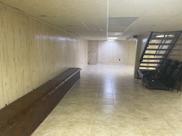 5250 Hardwoods Dr, West Bloomfield, MI 48323 - finished below grade area featuring wood walls, stairway, and a drop ceiling