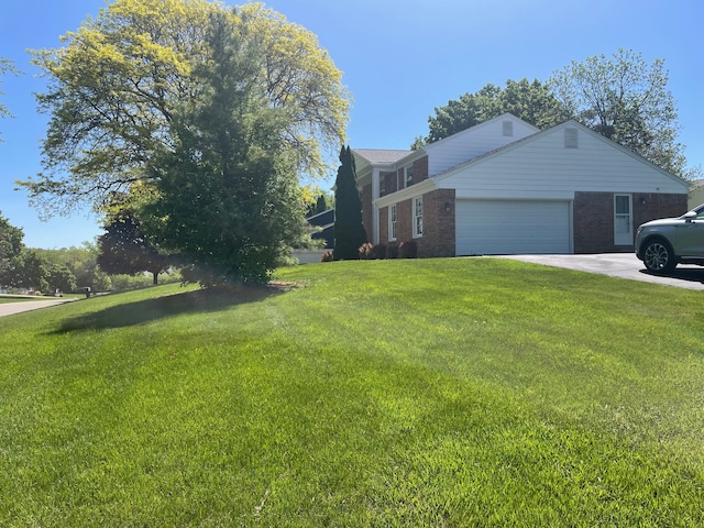 5250 Hardwoods Dr, West Bloomfield, MI 48323 - view of side of property featuring brick siding, a yard, a garage, and driveway