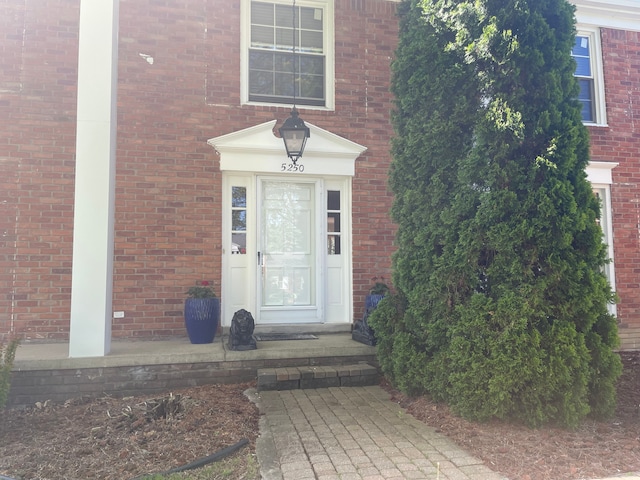 5250 Hardwoods Dr, West Bloomfield, MI 48323 - doorway to property with brick siding