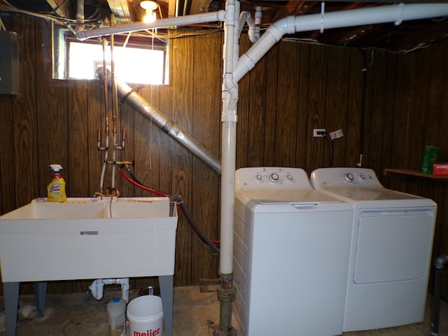 4140 Academy St, Dearborn Heights, MI 48125 - washroom with washing machine and clothes dryer and wooden walls