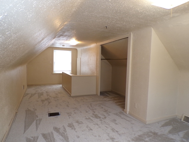 4140 Academy St, Dearborn Heights, MI 48125 - additional living space with vaulted ceiling and light carpet