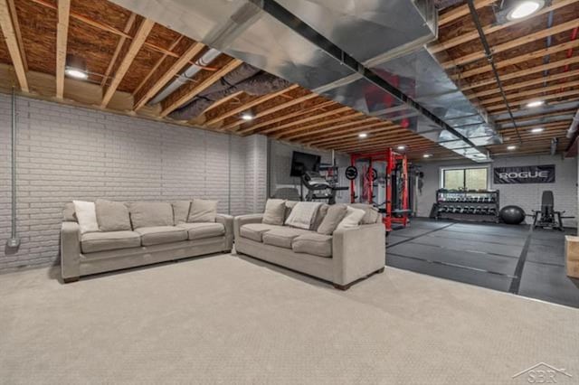 12405 Northway Pkwy, Freeland, MI 48623 - living room with brick wall and carpet flooring