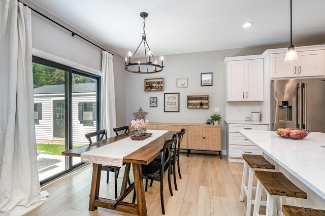 12405 Northway Pkwy, Freeland, MI 48623 - dining area with a chandelier, light wood-style flooring, and recessed lighting