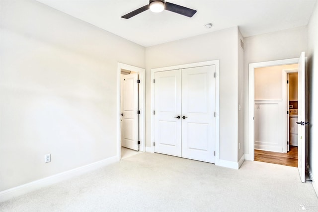 11020 S Custer Rd, Monroe, MI 48161 - unfurnished bedroom featuring light colored carpet, baseboards, a closet, and a ceiling fan