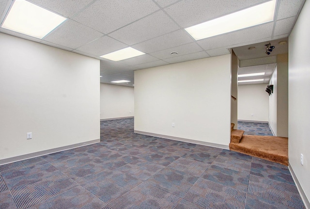 7512 Trophy Ct, Grass Lake, MI 49240 - below grade area with carpet floors, stairs, a drop ceiling, and baseboards